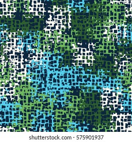Seamless background. The pattern of squares. Chaotic Spot. Fashion camouflage. Grungy textiles.