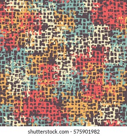 Seamless background. The pattern of squares. Chaotic Spot. Fashion camouflage. Grungy textiles.