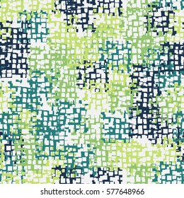Seamless background. The pattern of squares. Chaotic Spot. Fashion camouflage. Grungy textiles.