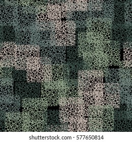Seamless background. The pattern of squares. Chaotic Spot. Fashion camouflage. Grungy textiles.