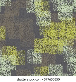 Seamless background. The pattern of squares. Chaotic Spot. Fashion camouflage. Grungy textiles.