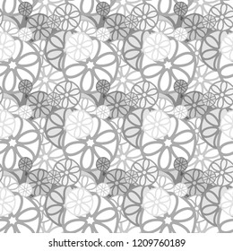 Seamless background pattern with a variety of colored floral motifs.