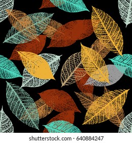 A seamless background pattern of vector skeleton leaves in teal blue and rusty brown on black, autumnal repeat print