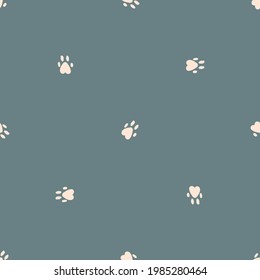 Seamless background paw print gender neutral pattern. Whimsical minimal earthy 2 tone color. kids nursery wallpaper or boho cartoon pet fashion all over print.