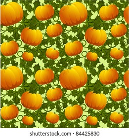 Seamless background with pumpkins in orange color