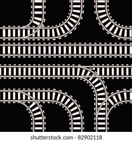 Seamless background of railway tracks on black