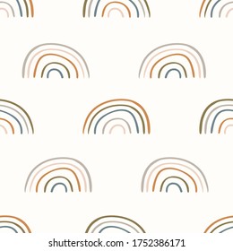 Seamless background rainbow gender neutral baby pattern. Simple whimsical minimal earthy 2 tone color. Kids nursery wallpaper or boho fashion all over print. 