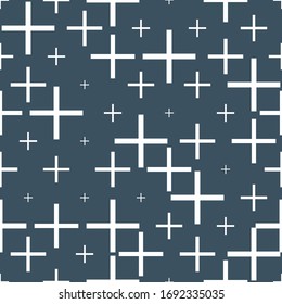 Fondo impecable. Cruces médicos de tamaño aleatorio aislados en un fondo azul. concepto para covid-19.