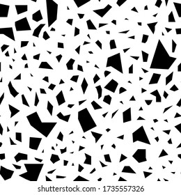 Seamless background of randomly placed sharp black and white pieces. Small and large fragments. Vector illustration for wrapping paper, textile print. Abstract mosaic seamless pattern. Endless texture