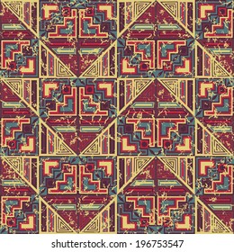 Seamless background in retro colors. Geometric pattern. Abstract design. Grunge style   
