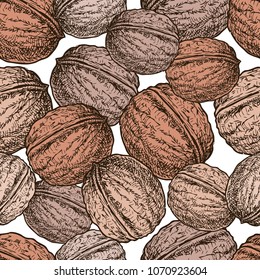 Seamless background of the ripe walnuts