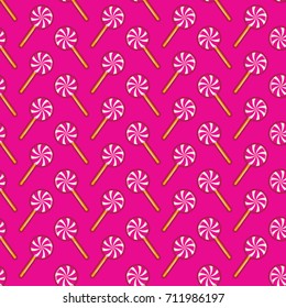 Seamless background of round pink candy on a stick on pink backg