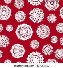 Seamless background from a set of white paper snowflakes, vector illustration.