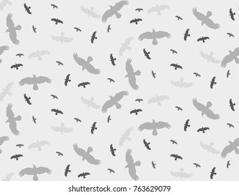 seamless background with a silhouette of flying birds gray