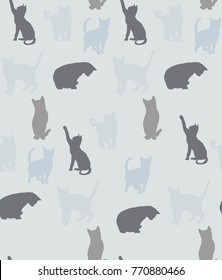 seamless background with silhouettes of cats