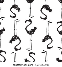 Seamless background of silhouettes of drawn flamingos
