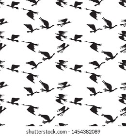 Seamless background of silhouettes of migratory geese in flight