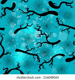 Seamless background with silhouettes of spider webs and tree branches. Vector illustration for your design. Happy Halloween background.