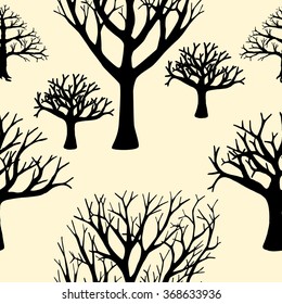 Seamless background of silhouettes of trees.