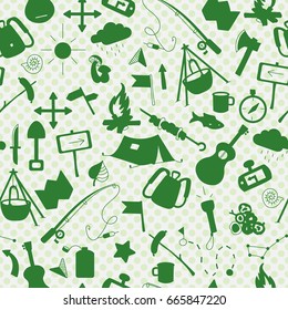 Seamless background with simple  icons on the theme of camping and traveling,  a green silhouettes of icons on the background of polka dots