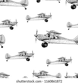 Seamless background of sketches of old airplanes