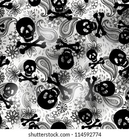 Seamless background with skulls and flowers