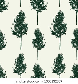 Seamless background of small rowan trees