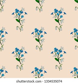 Seamless background with snowdrops and flowers forget-me-not on beige background. Endless pattern for your design.
