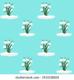 Seamless background with snowdrops. Vector repeating pattern with white flowers on a blue background. Background.