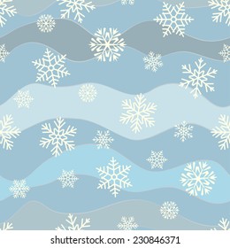 Seamless background with snowflakes and sinuous wavy lines on a blue background