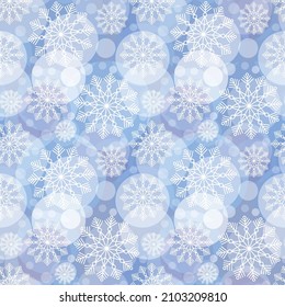 Seamless background with snowflakes for winter holidays.