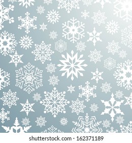 Seamless background with snowflakes.Vector