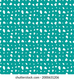 Seamless background with speckles. White dots of different sizes and shapes on a turquoise background.