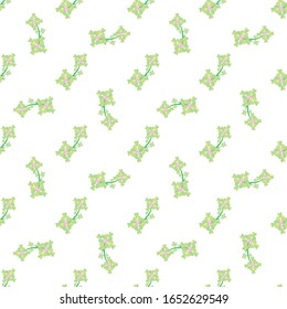 Seamless background texture with green shamrock leaves.
