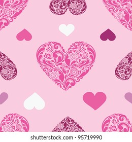 Seamless background texture with hearts.
