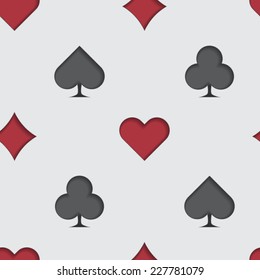 Seamless background tile with cut out 3d effect playing card suit symbols.  This file is Vector EPS10. It uses clipping mask, blends and transparencies. 