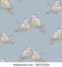 Seamless background of titmouses in winter