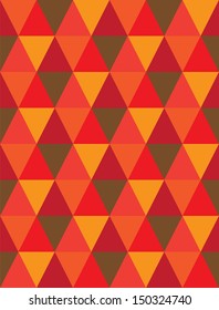 seamless background of triangle & diamond geometric shapes- vector graphic. This illustration consists of repetitive mosaic tiles pattern made of orange, red, brown colors