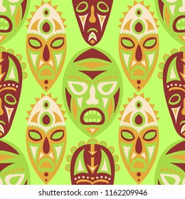 Seamless Background. Tribal Seamless Pattern with Color Masks for Print or Card. Ethnic Seamless Background with Color Trible Ritual Masks for your Design. Vector Texture.