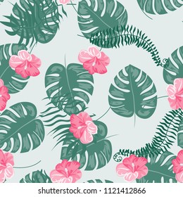 Seamless background with tropical flowers isolated.