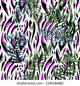 Seamless background with tropical leaves and  .