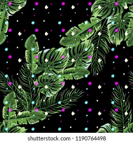 Seamless background with tropical leaves
