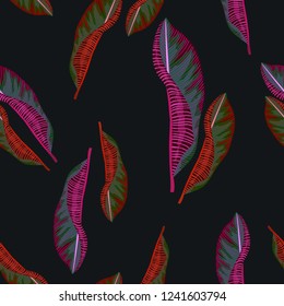 Seamless background with tropical leaves