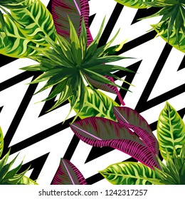 Seamless background with tropical leaves