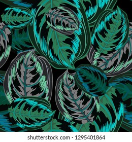 Seamless background with tropical leaves