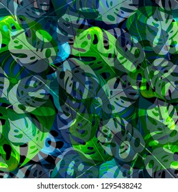 Seamless background with tropical leaves