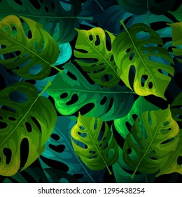 Seamless background with tropical leaves