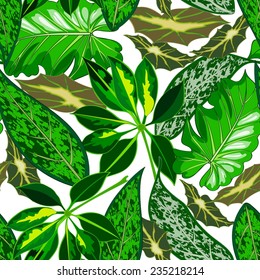Seamless background with tropical tropical leaves 