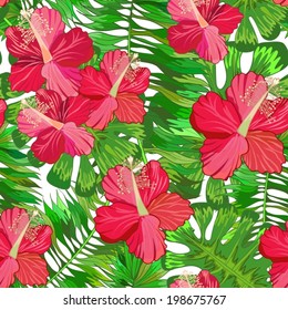 Seamless background with tropical leaves and flowers