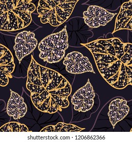 Seamless background with tropical  leaves.Golden tropical leaves.